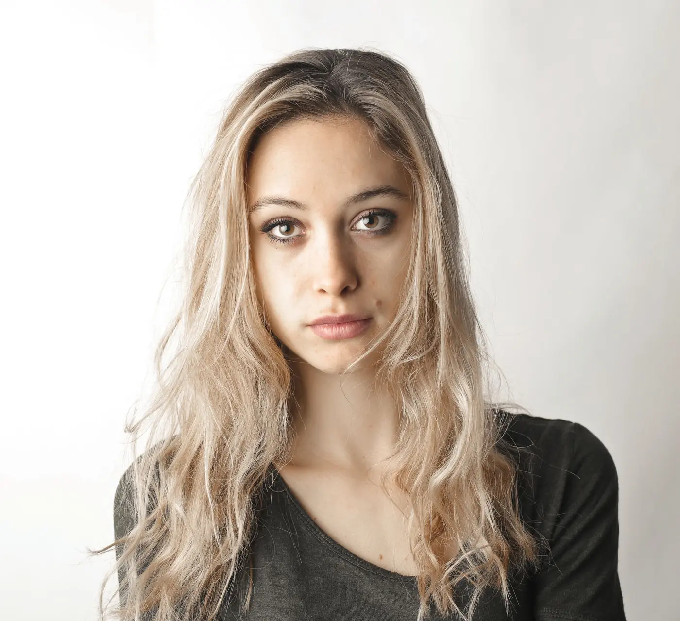 Portrait of a woman with long blonde waves