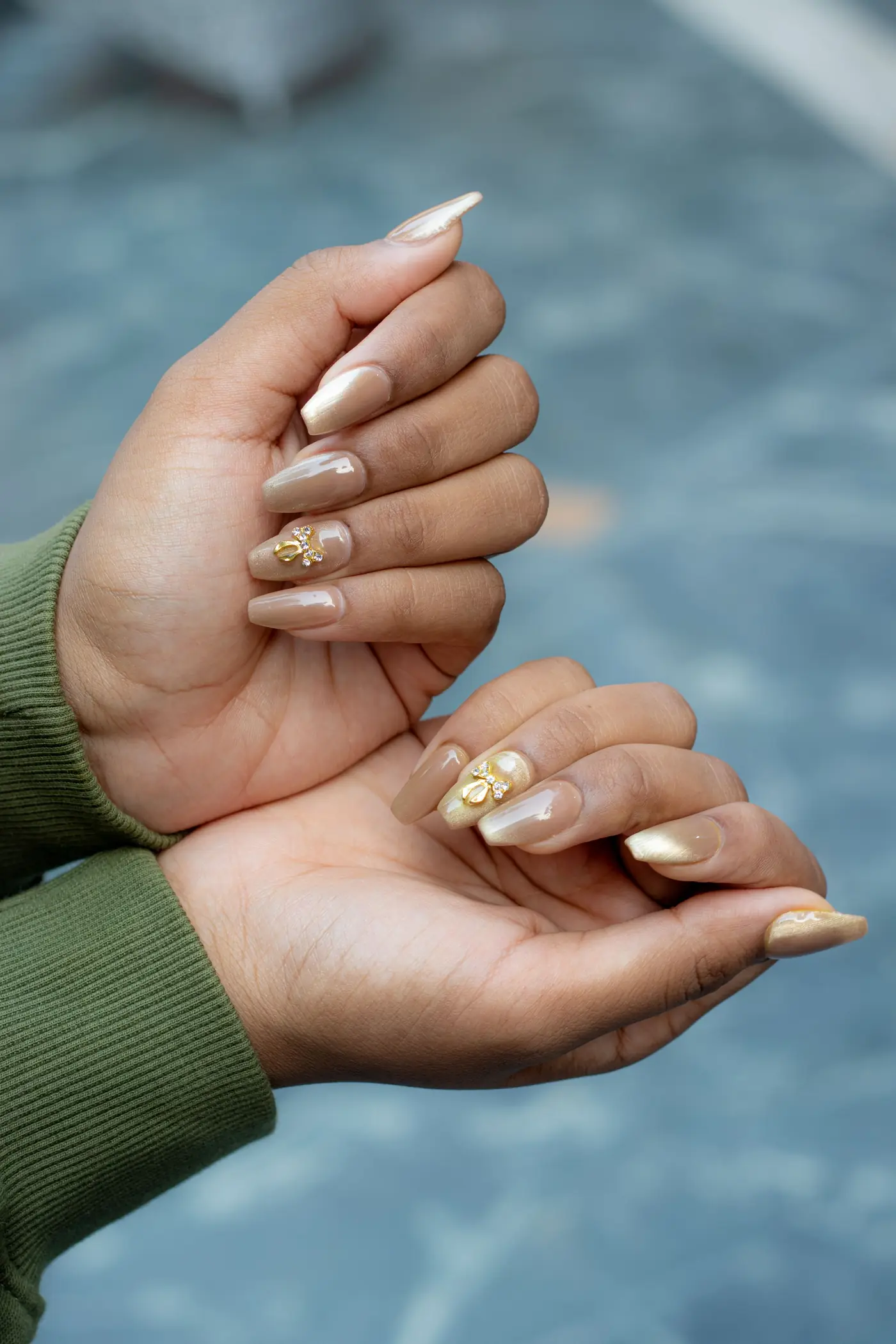 Nail art with gold leaf details