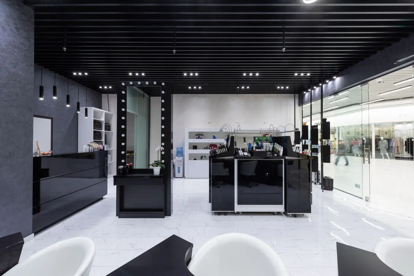 Reception and retail area in black and white